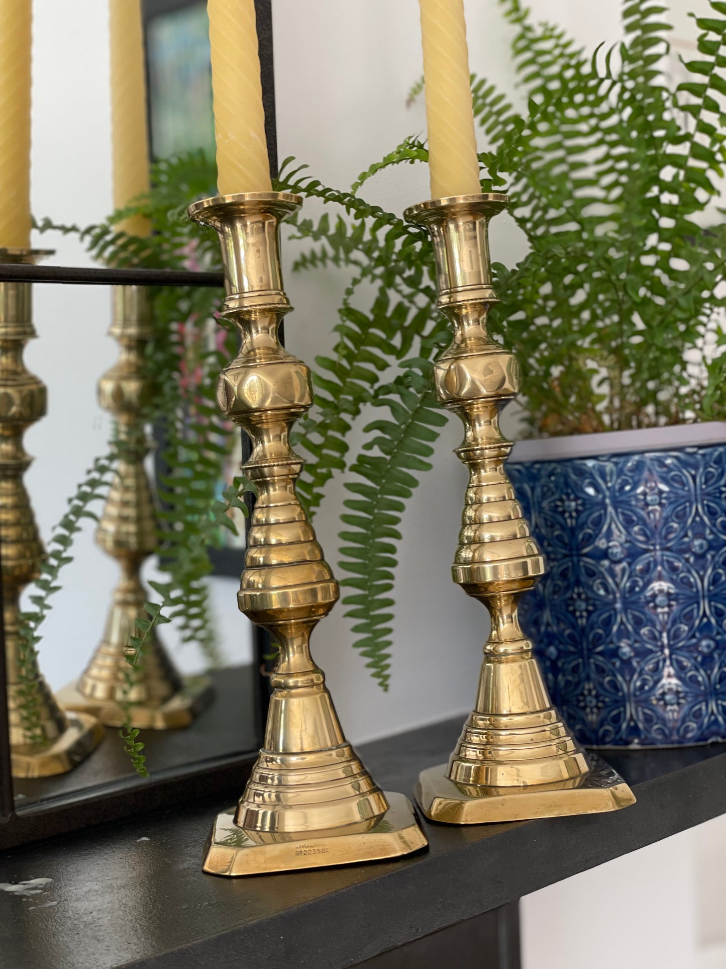 Unique pair of antique English Victorian 19th Century brass candlesticks stamped with Registration Design 223580 with 2 matching 100% London Beeswax candles