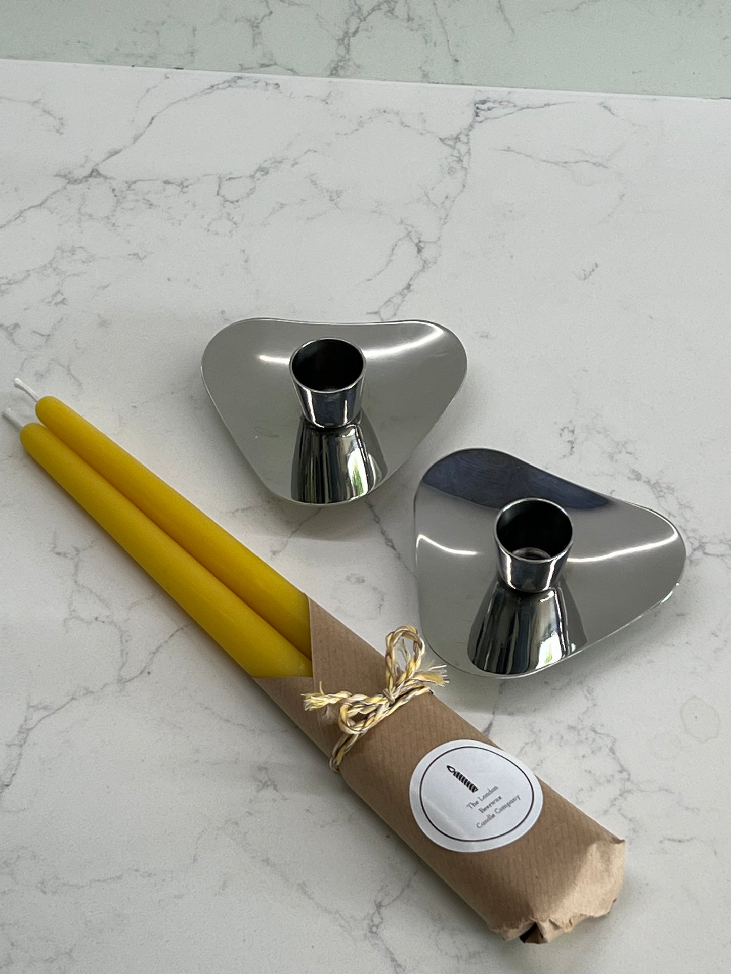 A stunning pair of stainless steel mid-century modern candlestick holders by Robert Welch for Old Hall from 1958. Vintage candlestick holders with 2 matching pure London beeswax candles. Dinner candle gift set. Eco beeswax candle gift. Unique gift set