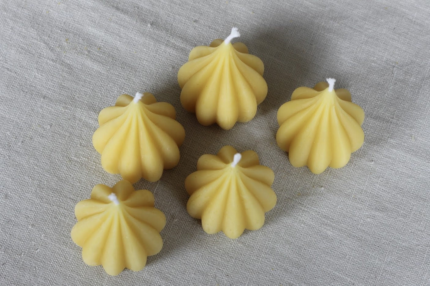 Pure beeswax zero-waste large tealight candle, Natural 'garlic' shaped tealight, Sustainable candles, Zero waste refills, Candles made from 100% beeswax sourced from small-scale London beekeepers, Beautiful organic, natural votive candles