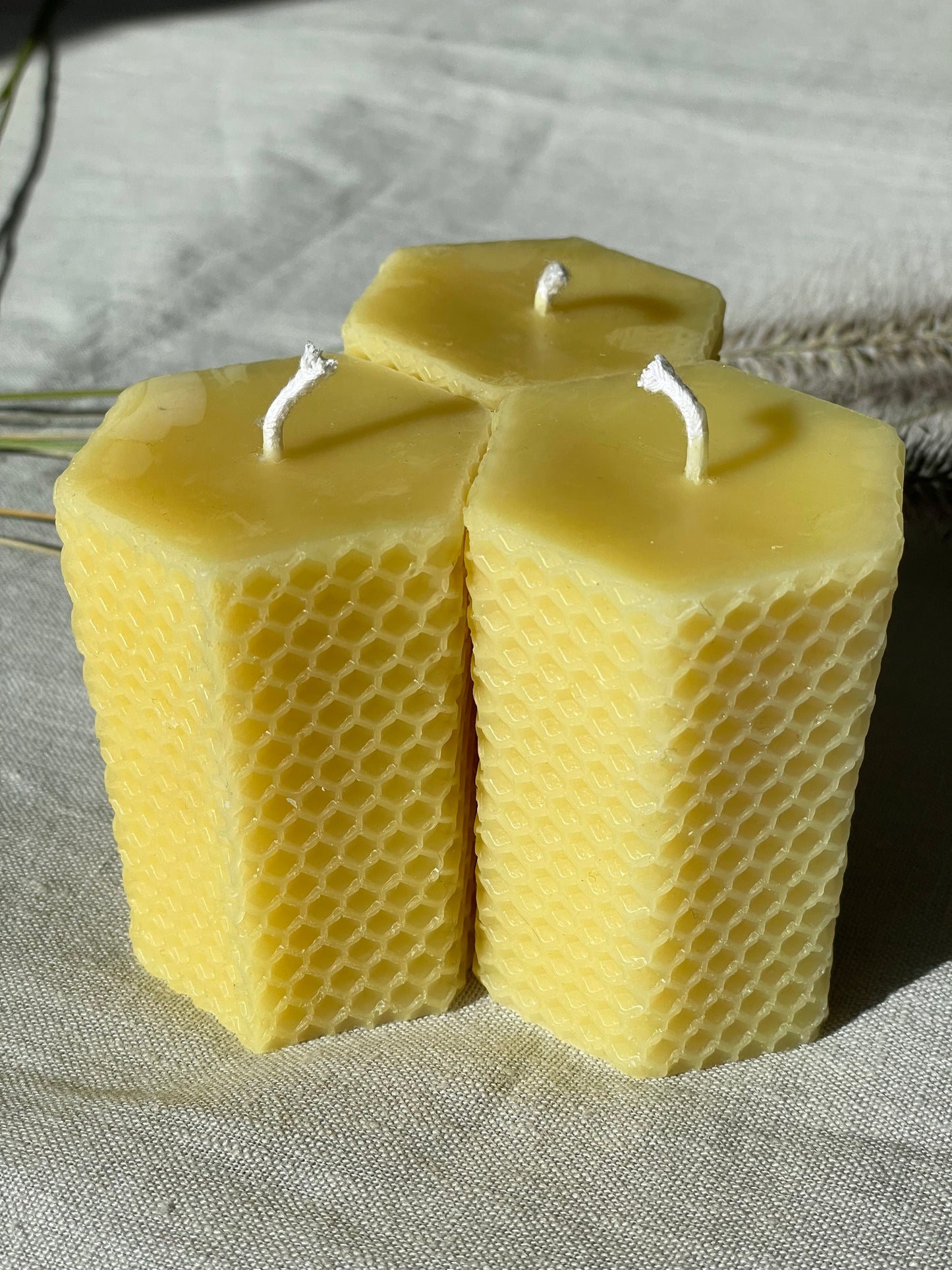 Pure beeswax hexagon pillar candles with eco-cotton wicks, Candles made from 100% pure beeswax sourced from small-scale London beekeepers, Hand-poured eco-friendly candle gift, Biodegradable gift wrappings