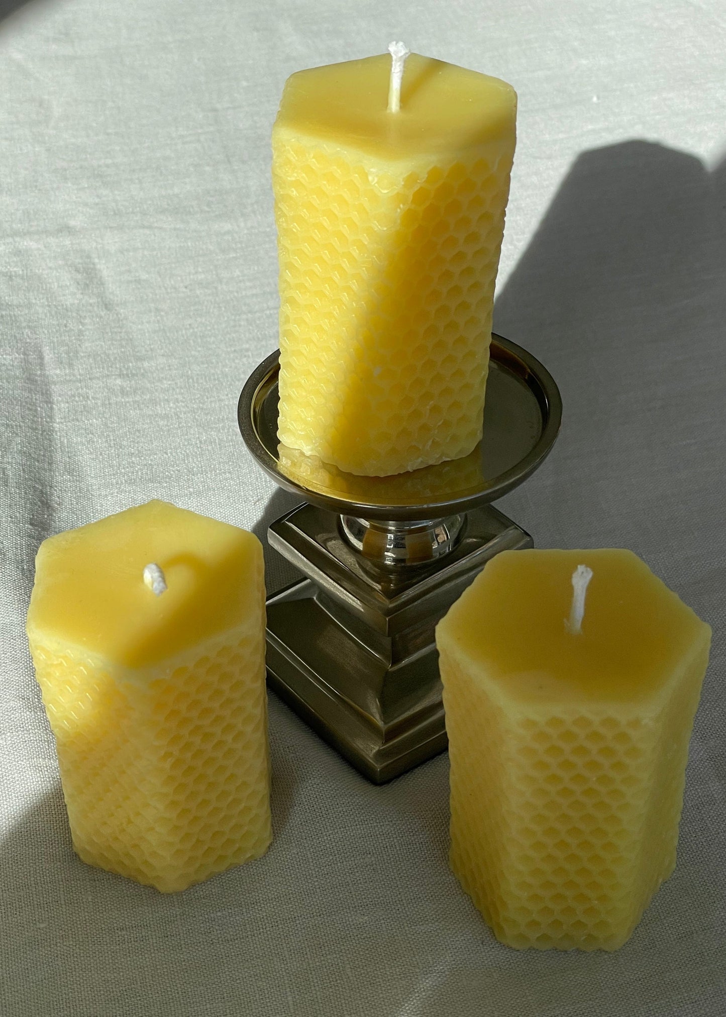 Pure beeswax hexagon pillar candles with eco-cotton wicks, Candles made from 100% pure beeswax sourced from small-scale London beekeepers, Hand-poured eco-friendly candle gift, Biodegradable gift wrappings