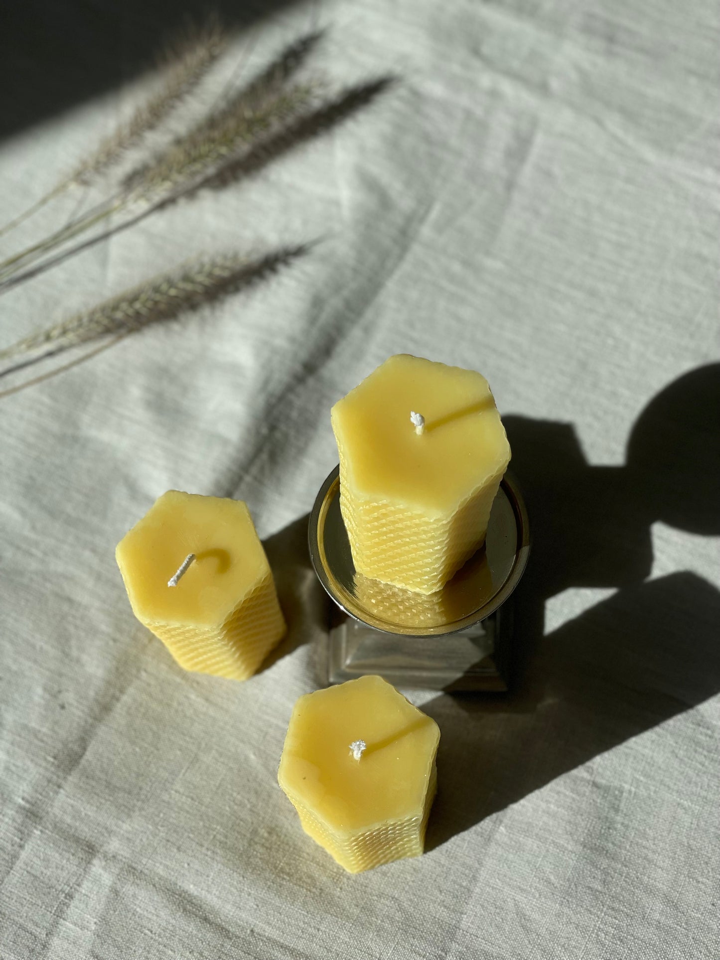 Pure beeswax hexagon pillar candles with eco-cotton wicks, Candles made from 100% pure beeswax sourced from small-scale London beekeepers, Hand-poured eco-friendly candle gift, Biodegradable gift wrappings