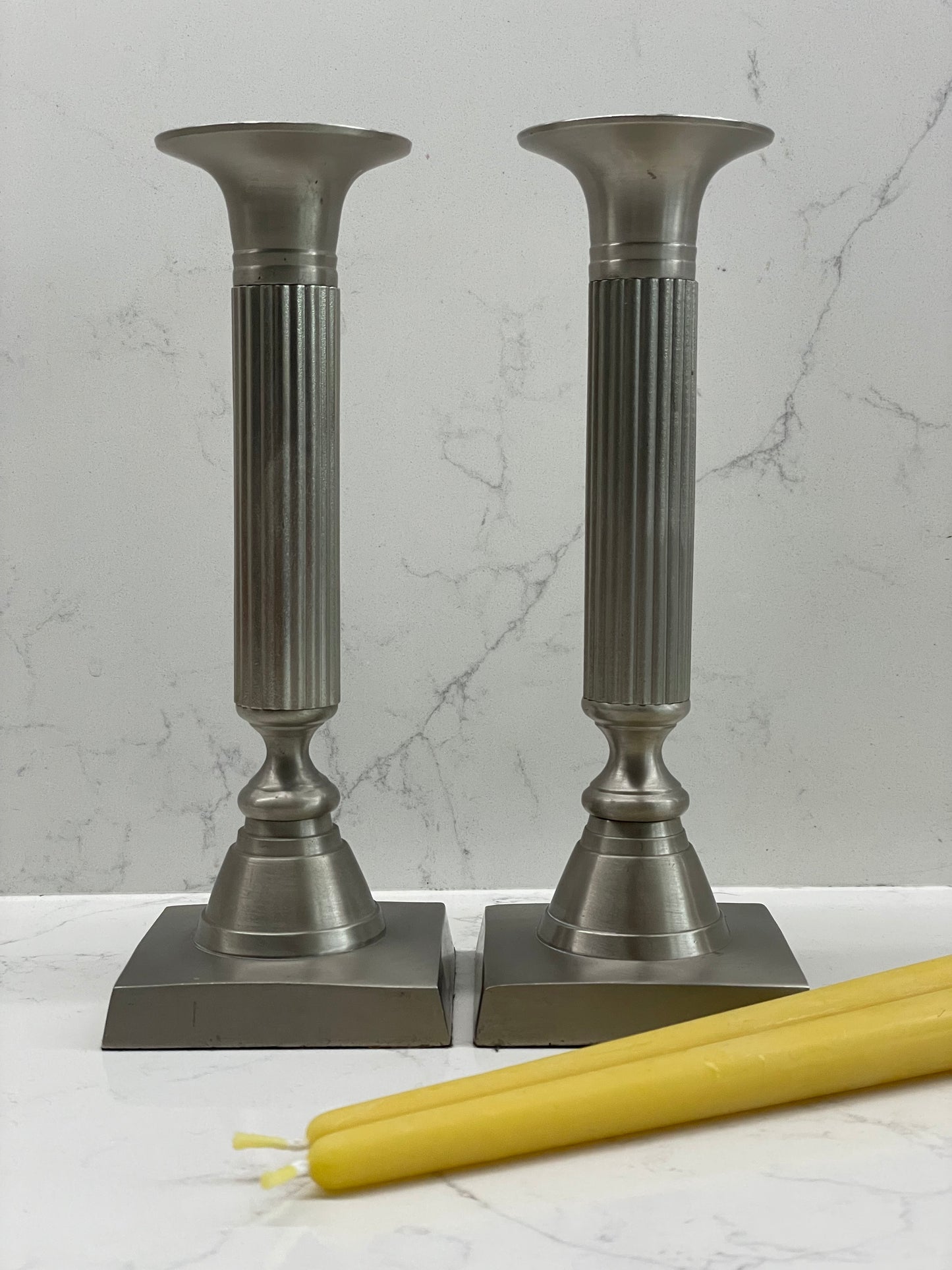 Stunning pair of 1980's solid pewter column candlesticks with two pure London beeswax taper candles. Square based candlesticks. Unique candle gift set