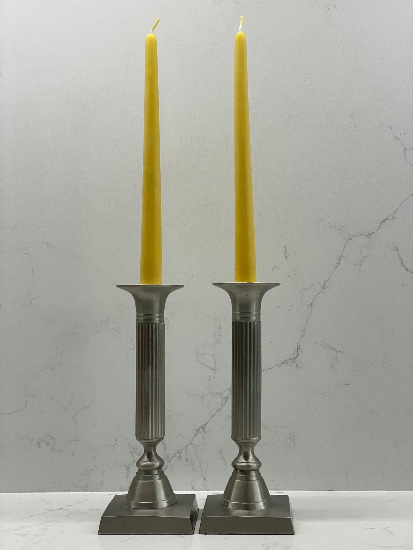 Stunning pair of 1980's solid pewter column candlesticks with two pure London beeswax taper candles. Square based candlesticks. Unique candle gift set