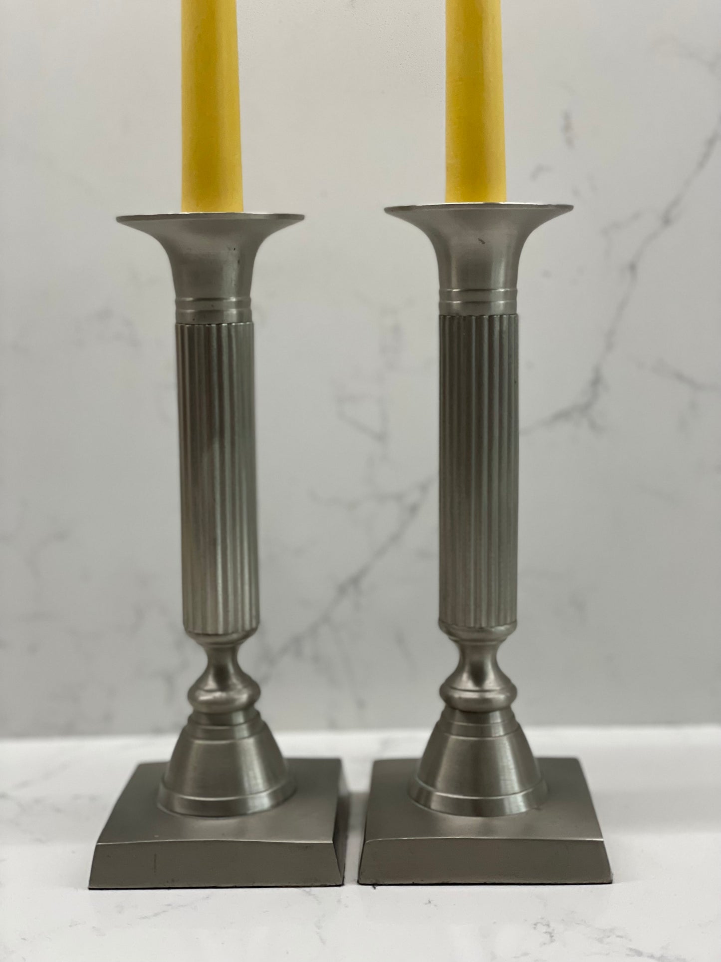 Stunning pair of 1980's solid pewter column candlesticks with two pure London beeswax taper candles. Square based candlesticks. Unique candle gift set