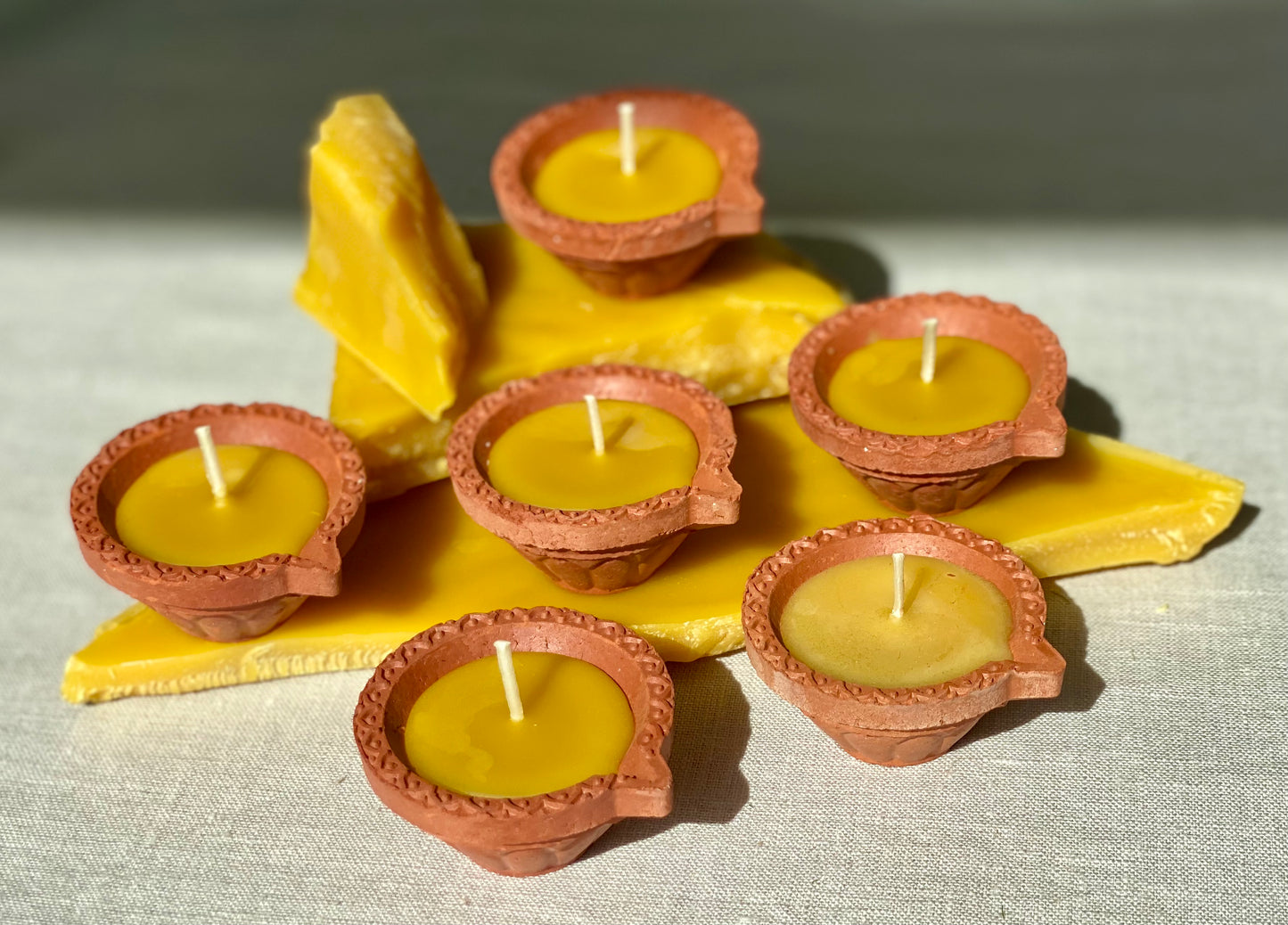 Pure beeswax candles in terracotta pots, Candles made from 100% pure beeswax sourced from small-scale London beekeepers, Stunning garden tealights