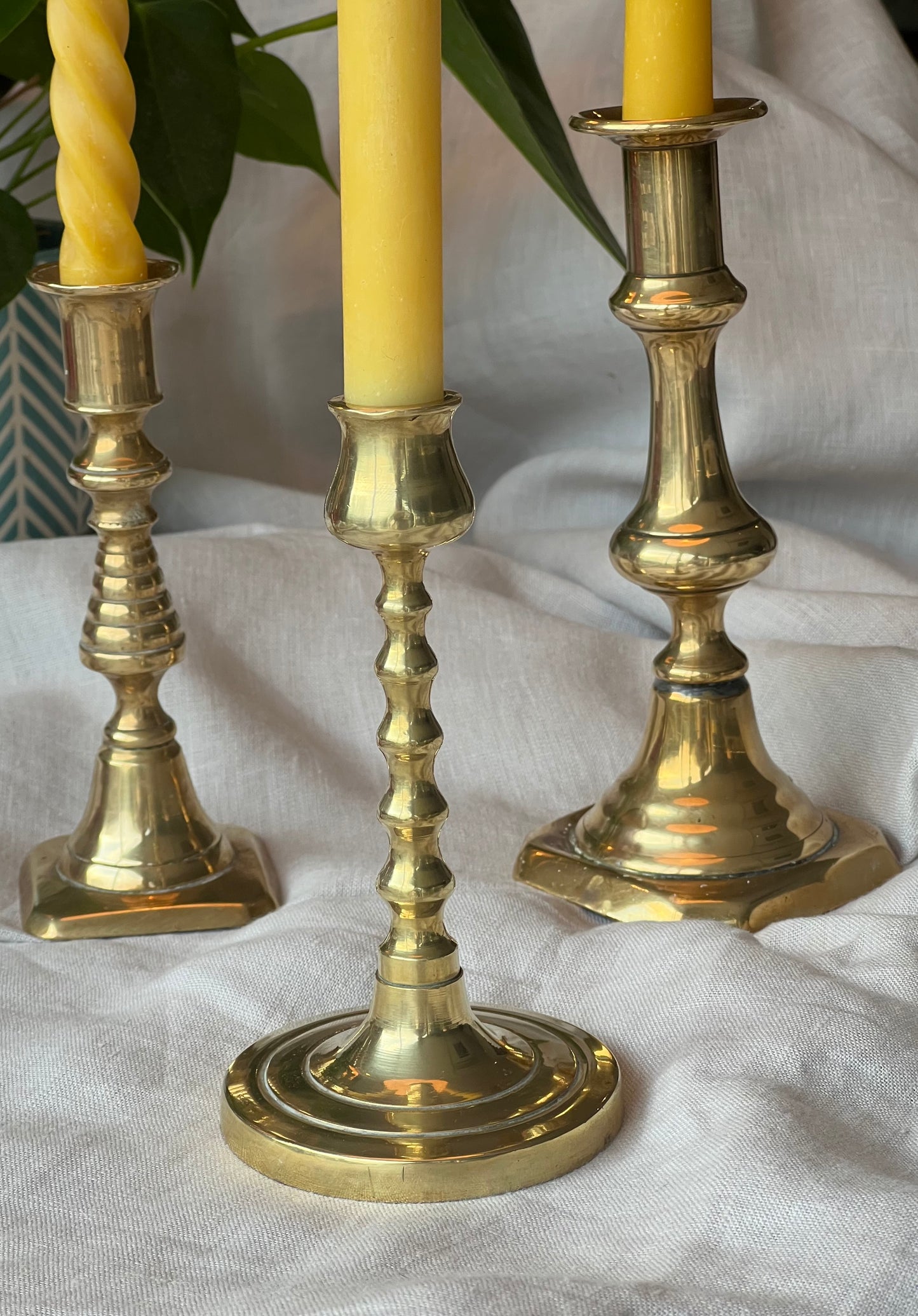 Five beautiful, unique antique candlestick holders with a matching pure London beeswax candle. Vintage brass candlestick gift. Dinner candle gift set. Eco beeswax candle gift. Unique gift set. Victorian ornate candle holder.