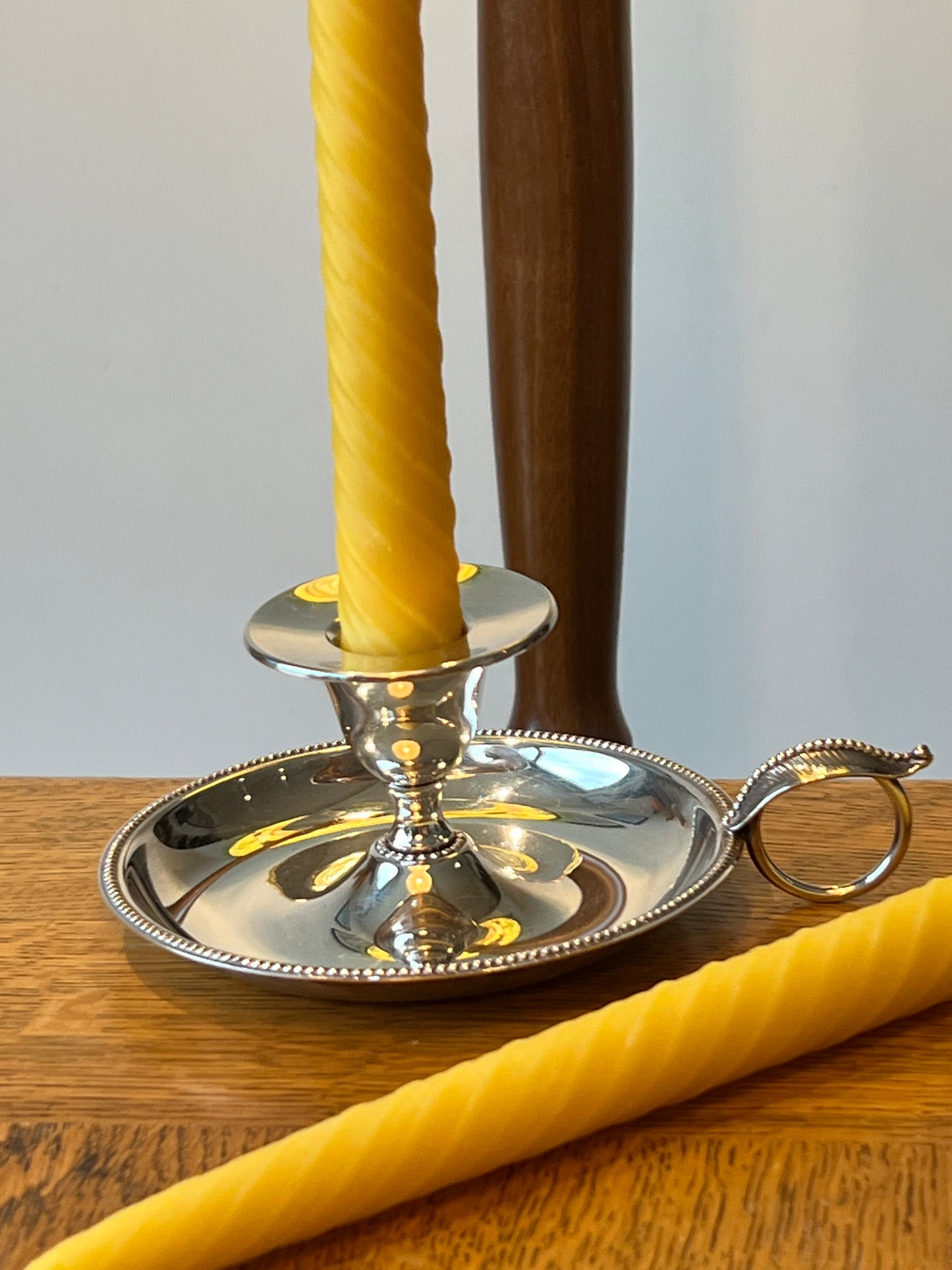 Two beautiful vintage chamber candlestick holders with 2 matching pure London beeswax candle gift set.  Wee willie winkie unique Christmas gift. Pure London Beeswax Candles Natural candles. Natural sustainable gift set