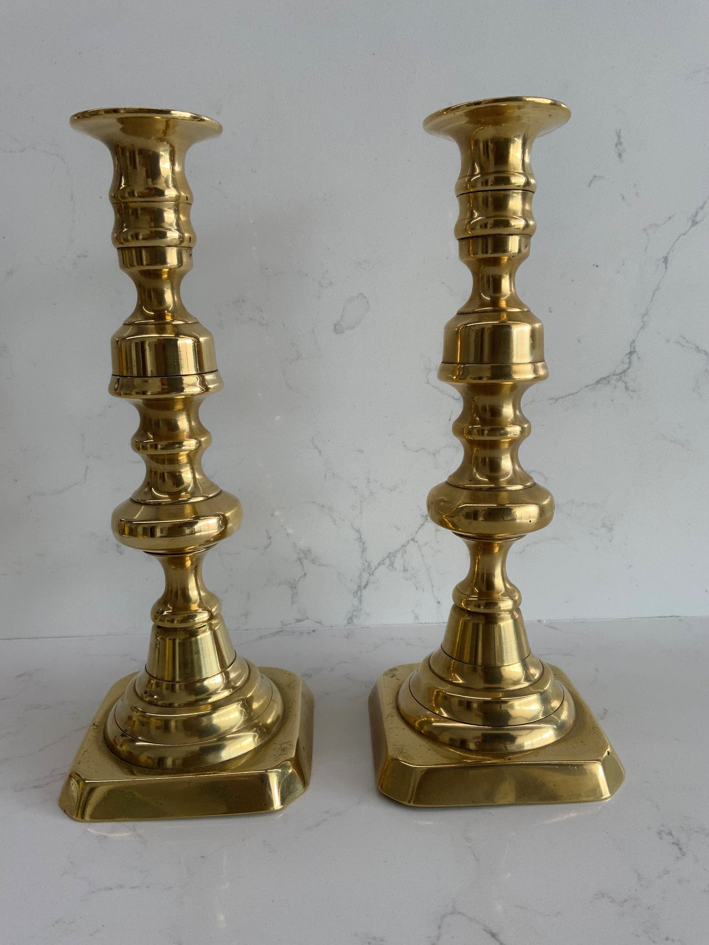 A beautiful pair of large antique Victorian brass candlesticks with 2 matching 100% London Beeswax Candles. Vintage polished brass holders